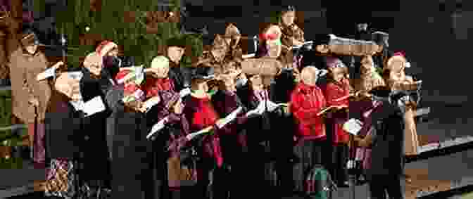 A Group Of Carolers Singing And Playing Guitars, Conveying The Communal Spirit Of Christmas Favorites For Solo Guitar